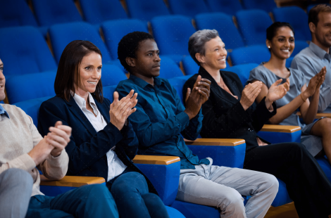 demo-attachment-1748-business-executives-applauding-business-meeting